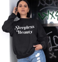 Load image into Gallery viewer, Oversized sweatshirt with Sleepless Beauty artwork screen printed across the front, shown on model.
